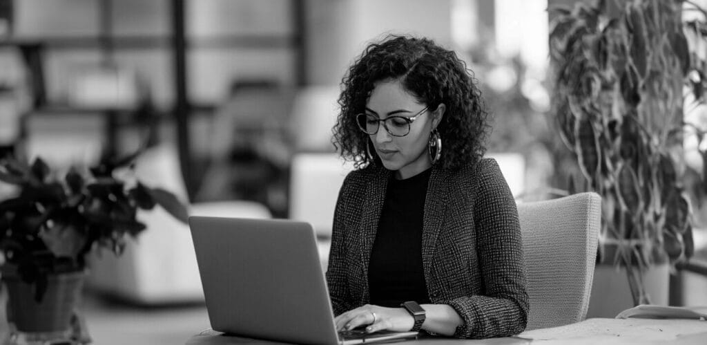 Woman looking at her laptop screen